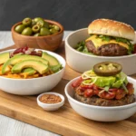 Three variations of burger bowls including keto with avocado, spicy with jalapeños, and classic with cheese and pickles, served in separate bowls with decorative toppings.